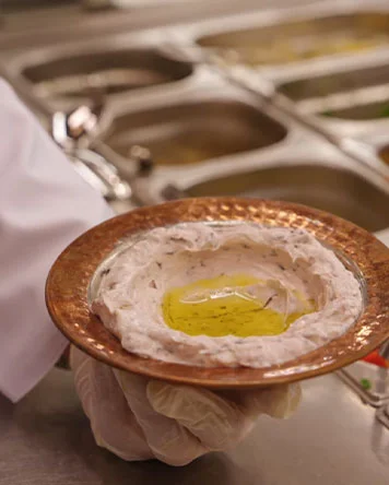 Traditional Hatay breakfast mezze served with olive oil at Hatay Gurme Istanbul